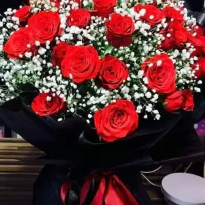 RED ROSE WITH BLACK SIGN