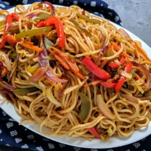 Street style stir fried noodles with assorted fresh veggies.