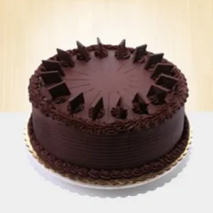 1/2 Kg Normal chocolate cake,Spark candle, knife(combo)