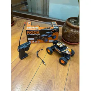 ORANGE ROCK CLIMBING CAR

