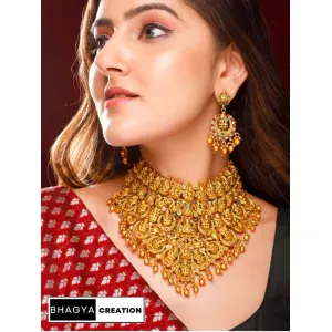 Bhagya's gold plated Red and green stone studded jewellery set