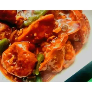 Gravy Chillie Momos (fried 6 pcs)