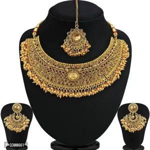 Gold Plated Traditional Choker Style Necklace Set With Maang Tikka

 Color:  Golden

 Mate