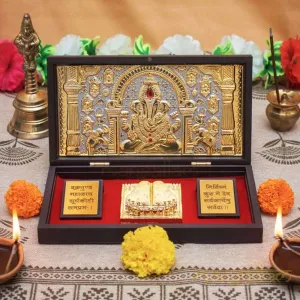 Dagadu Seth -
Gold Plated Shree Ganesha Photo Frame With Charan Paduka
- L
