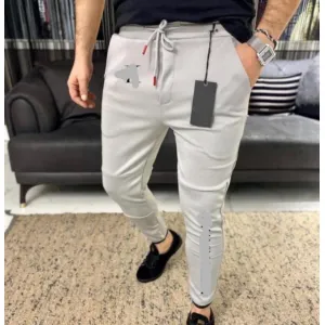 Solid, Self Design Men Grey Track Pants
(s)